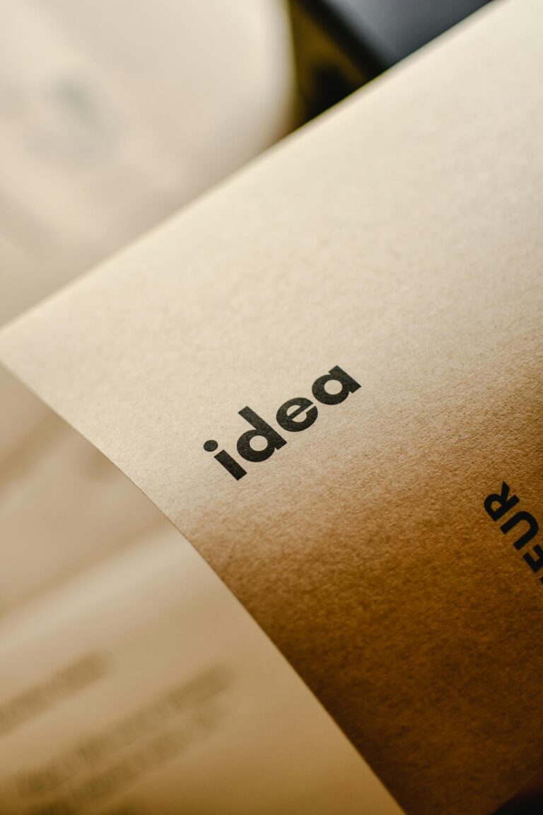 Close-up shot of the word 'idea' printed on brown paper, perfect for representing creativity and startups.